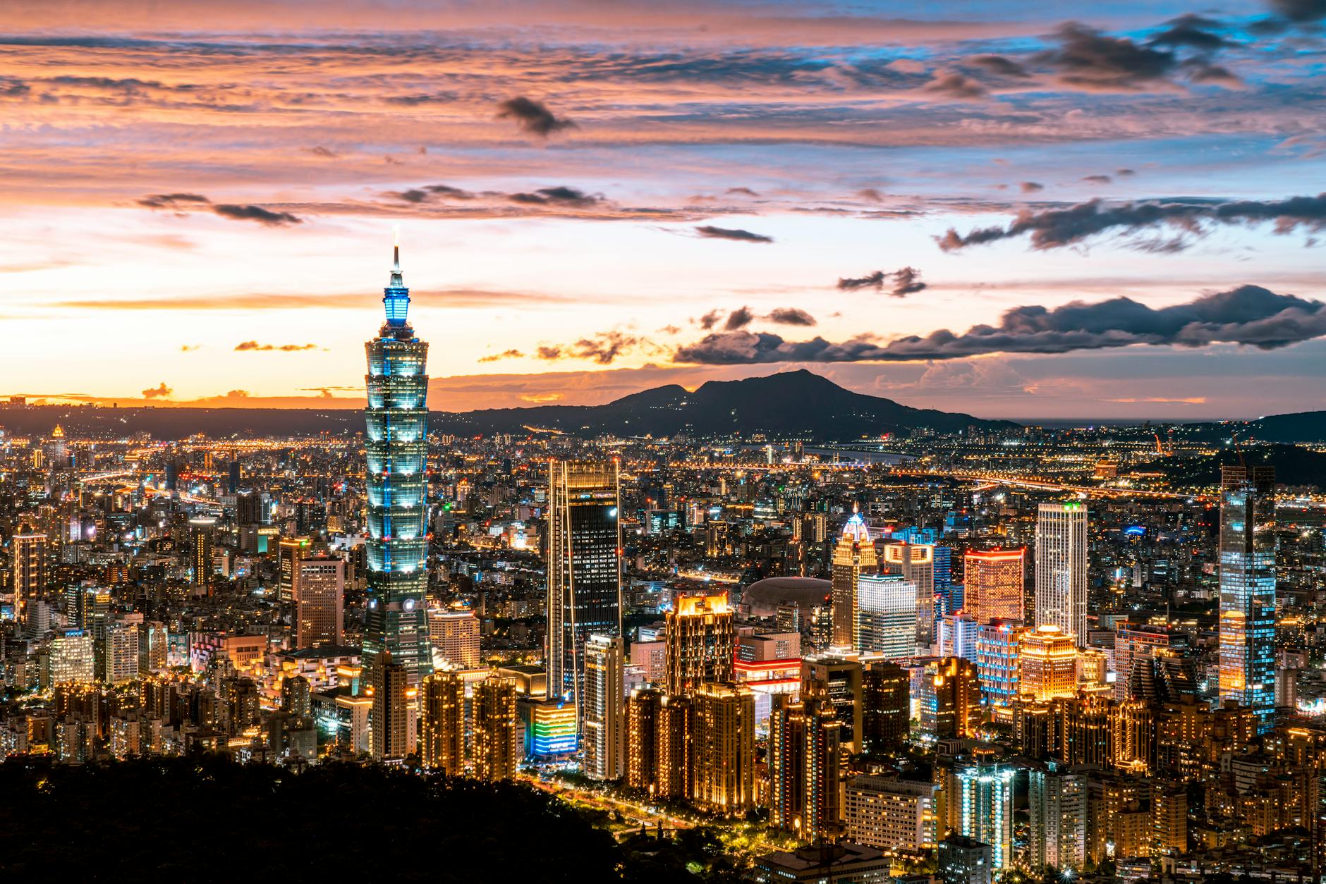 A picture of a global cityscape at sunset, symbolizing growth and opportunity