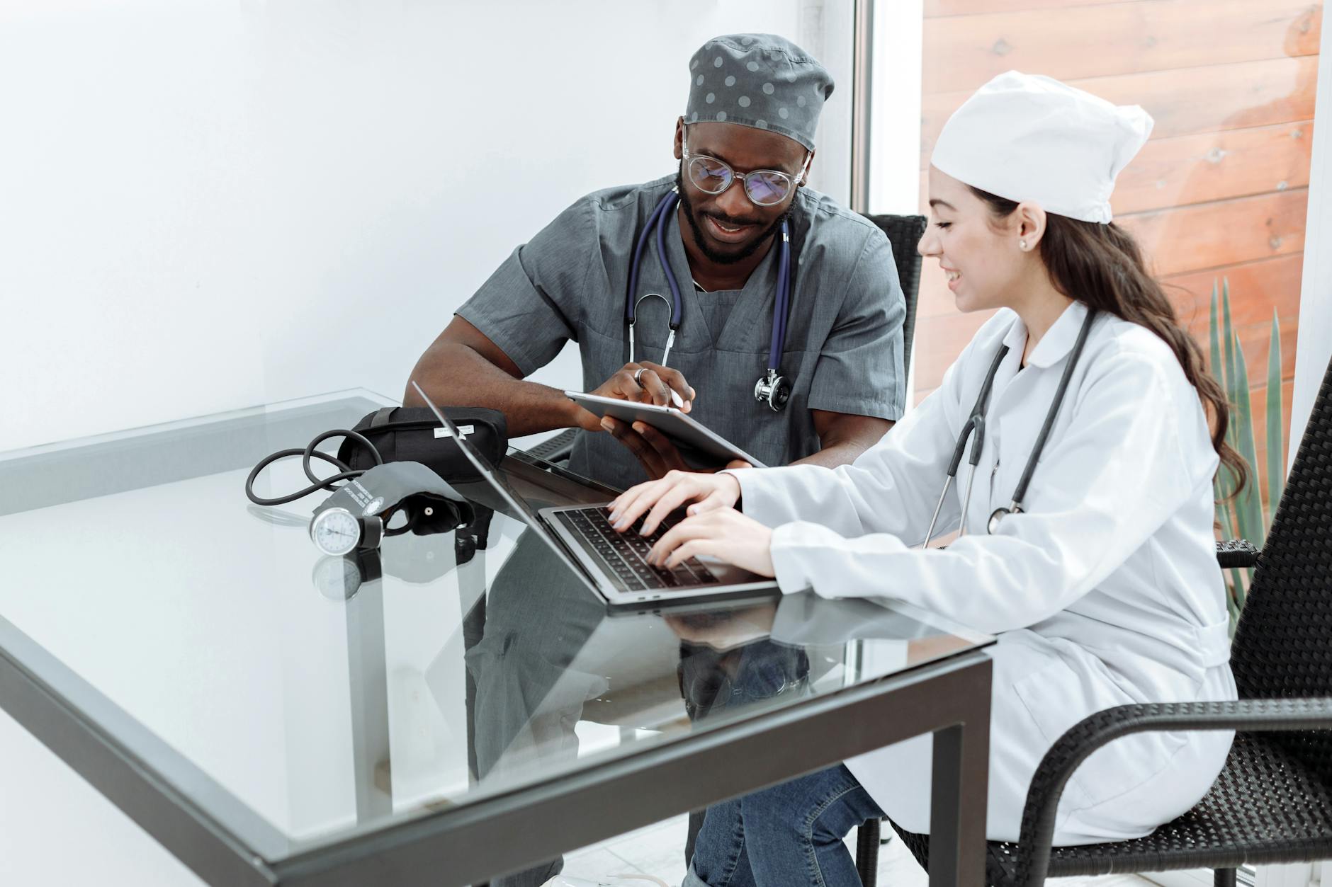 A picture of a healthcare professional and an AI robot working together