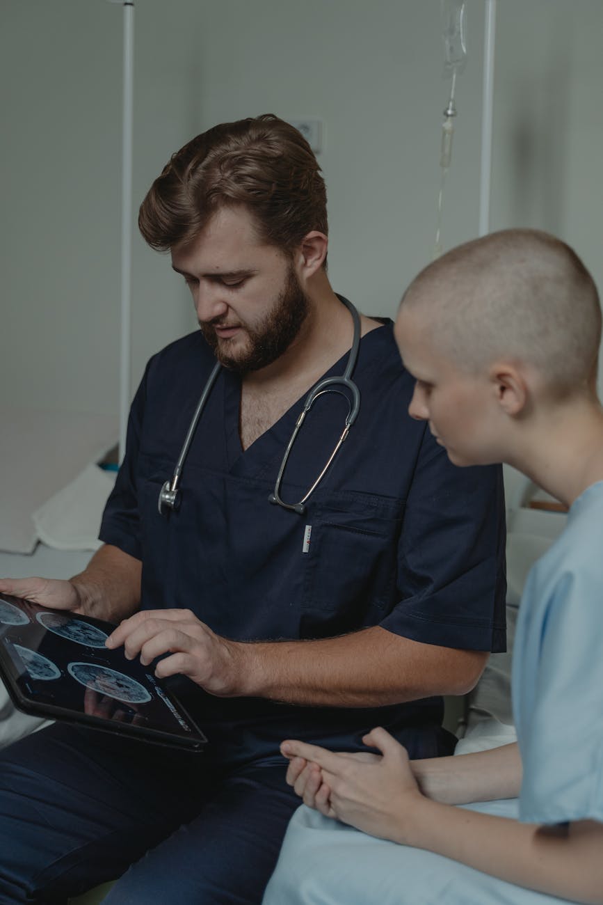 A doctor and a patient looking at a tablet with AI-generated health data