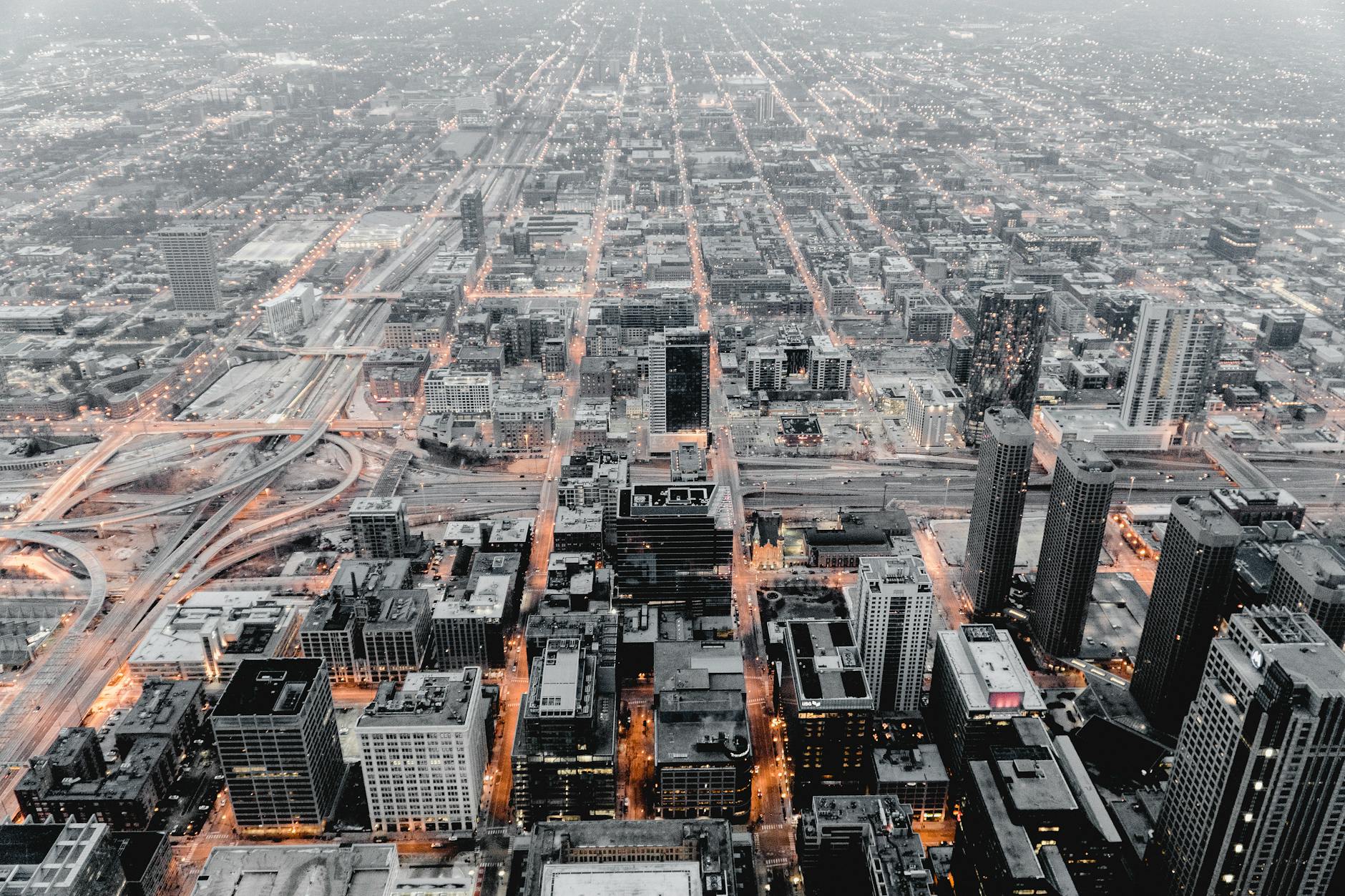 A cityscape with a hospital in the foreground, symbolizing the integration of AI in urban healthcare systems