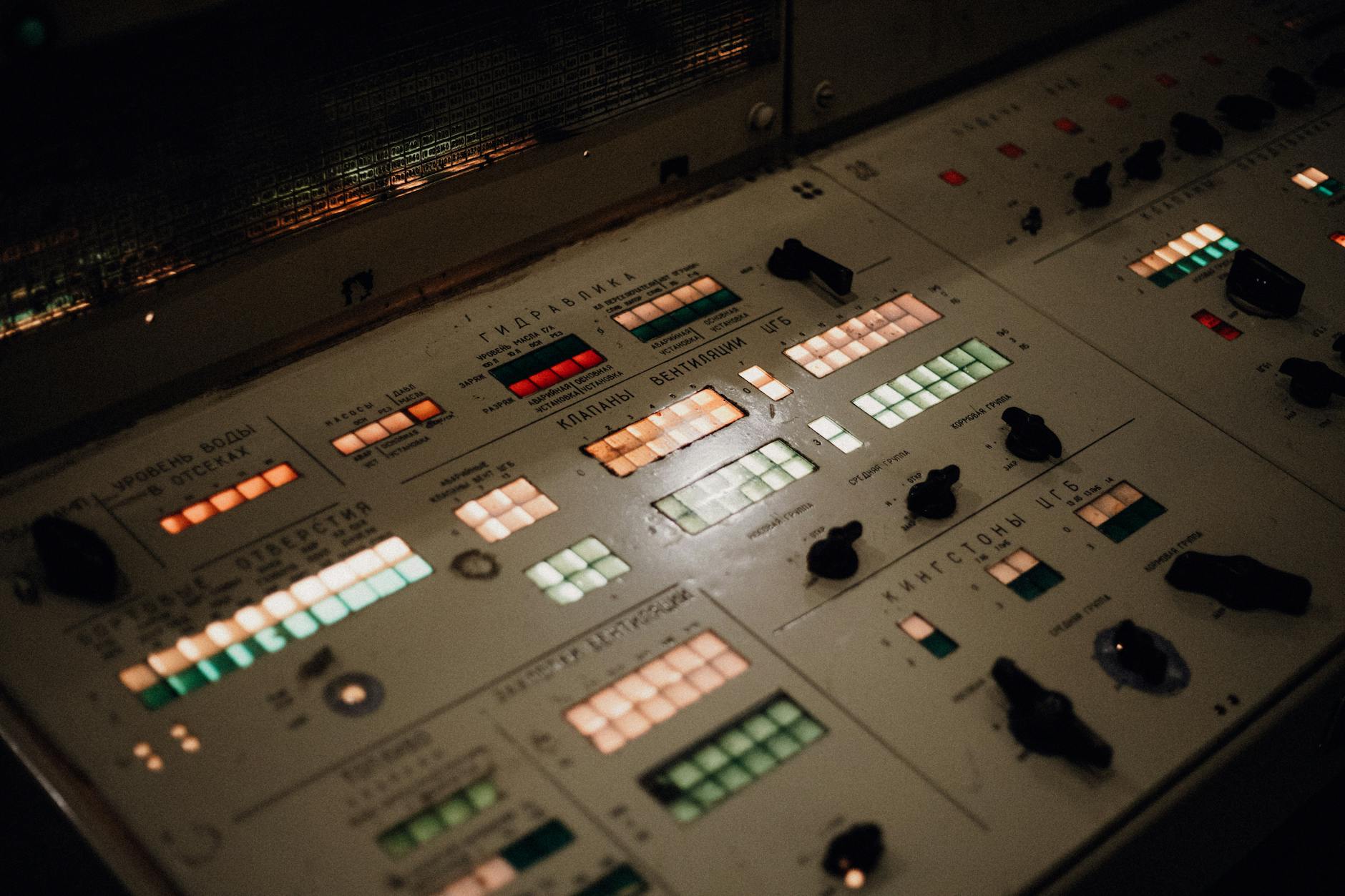 A futuristic control room interface, displaying real-time telemetry and 3D models of robot operations, showcasing advanced swarm control algorithms and MLOps dashboards.