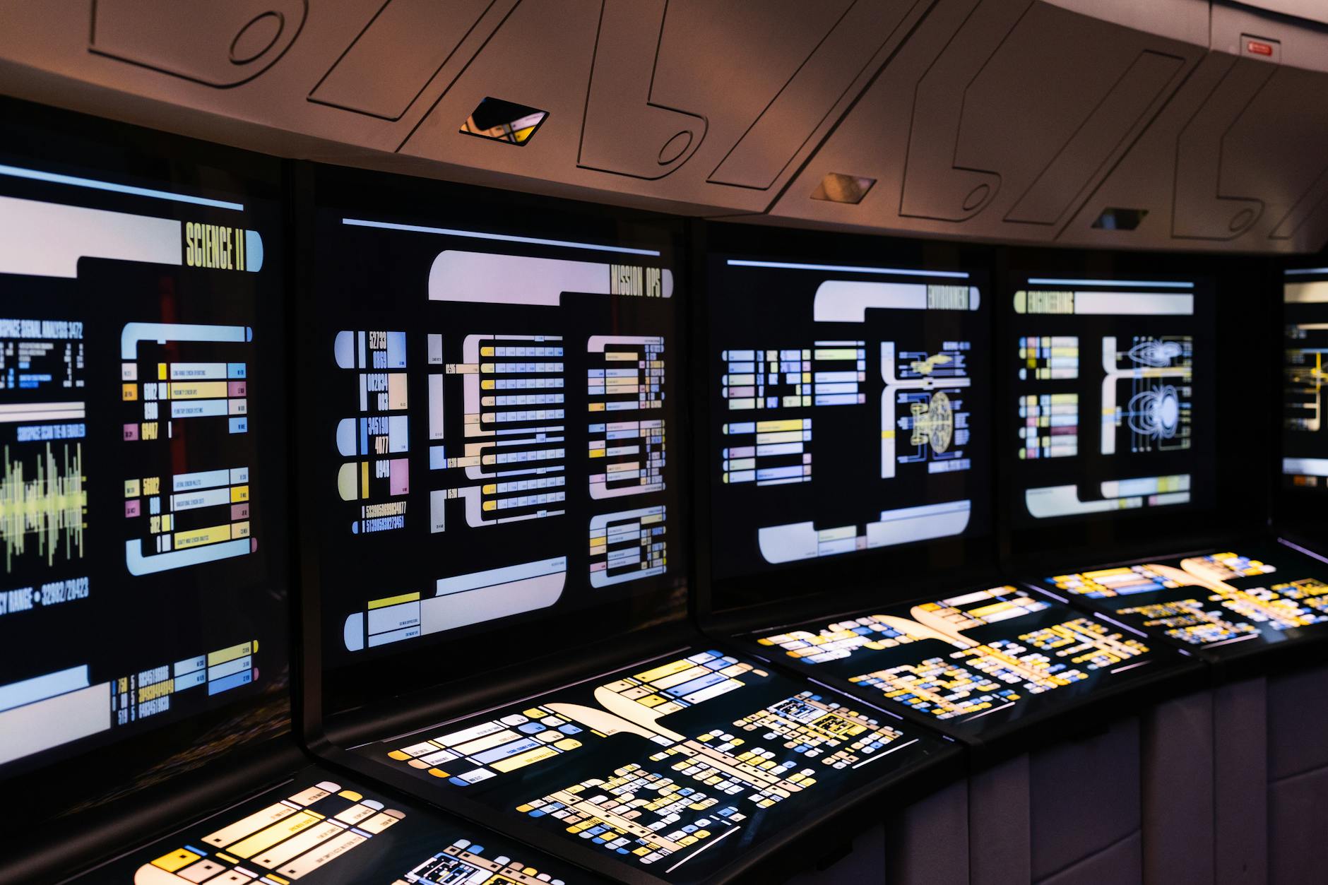 A futuristic control room interface, displaying real-time telemetry and 3D models of robot operations, showcasing advanced swarm control algorithms and MLOps dashboards.