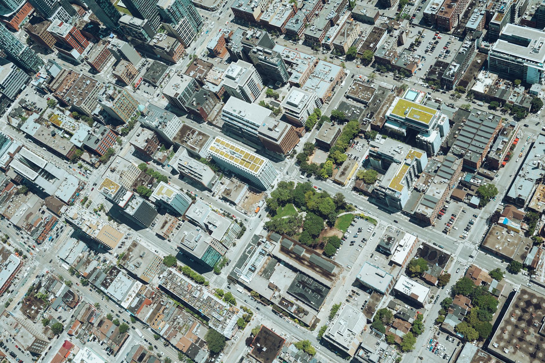 A visionary depiction of a future city where SMRs are seamlessly integrated into the urban fabric, providing clean, abundant energy, with AI managing the grid's complex dynamics.