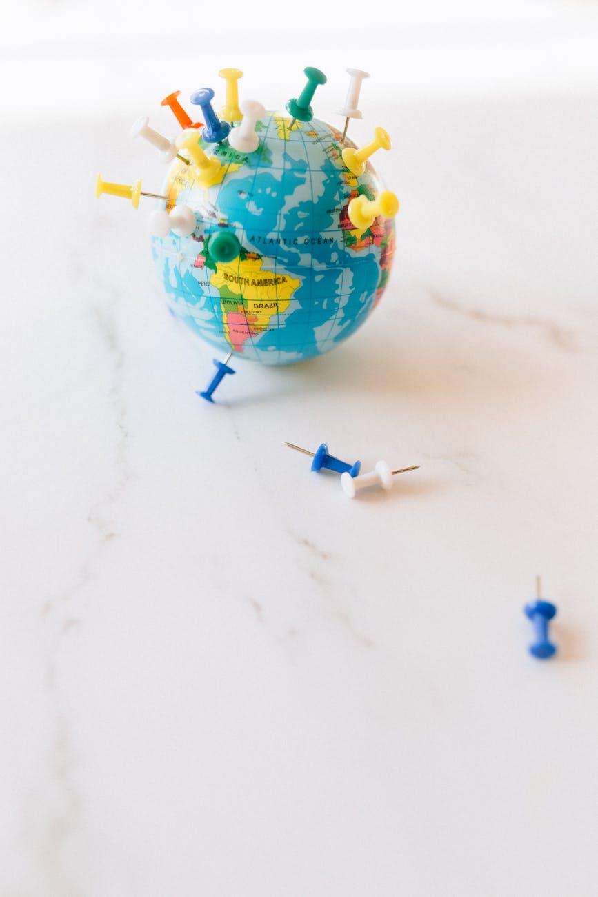 A world map with glowing nodes representing global efforts in PQC research and development, symbolizing international collaboration and competition.