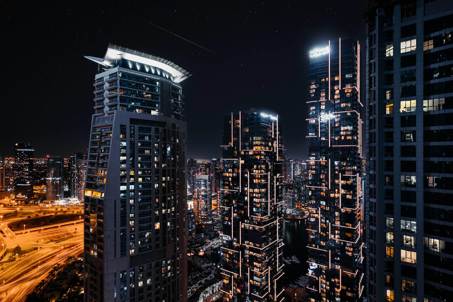 A wide shot of a futuristic orbital city, bustling with activity, connected by transport beams, with Earth visible in the distance.