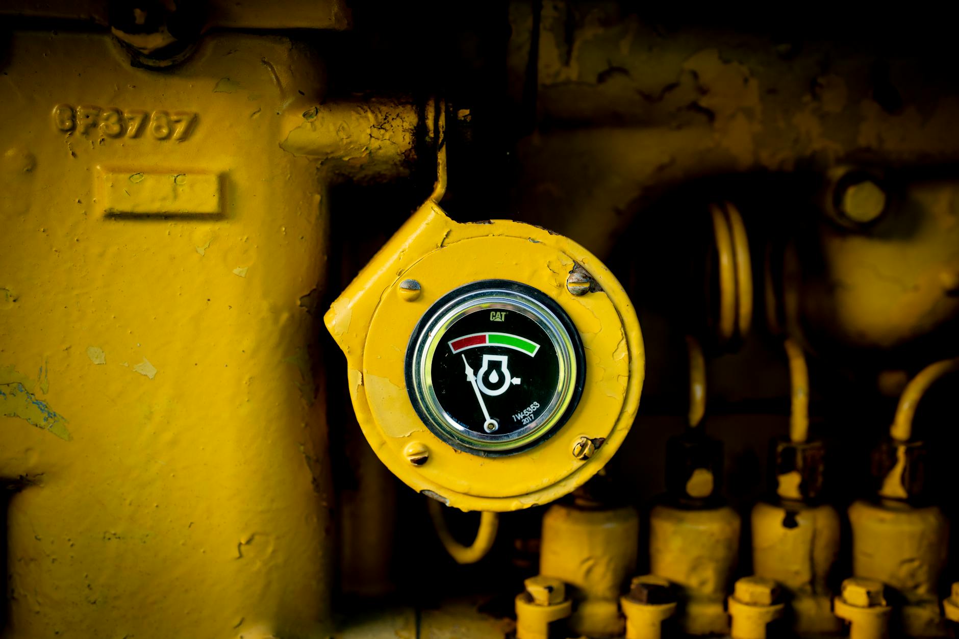 A close-up of a complex industrial machine part, with a digital overlay showing stress points and a projected RUL (Remaining Useful Life) indicator.