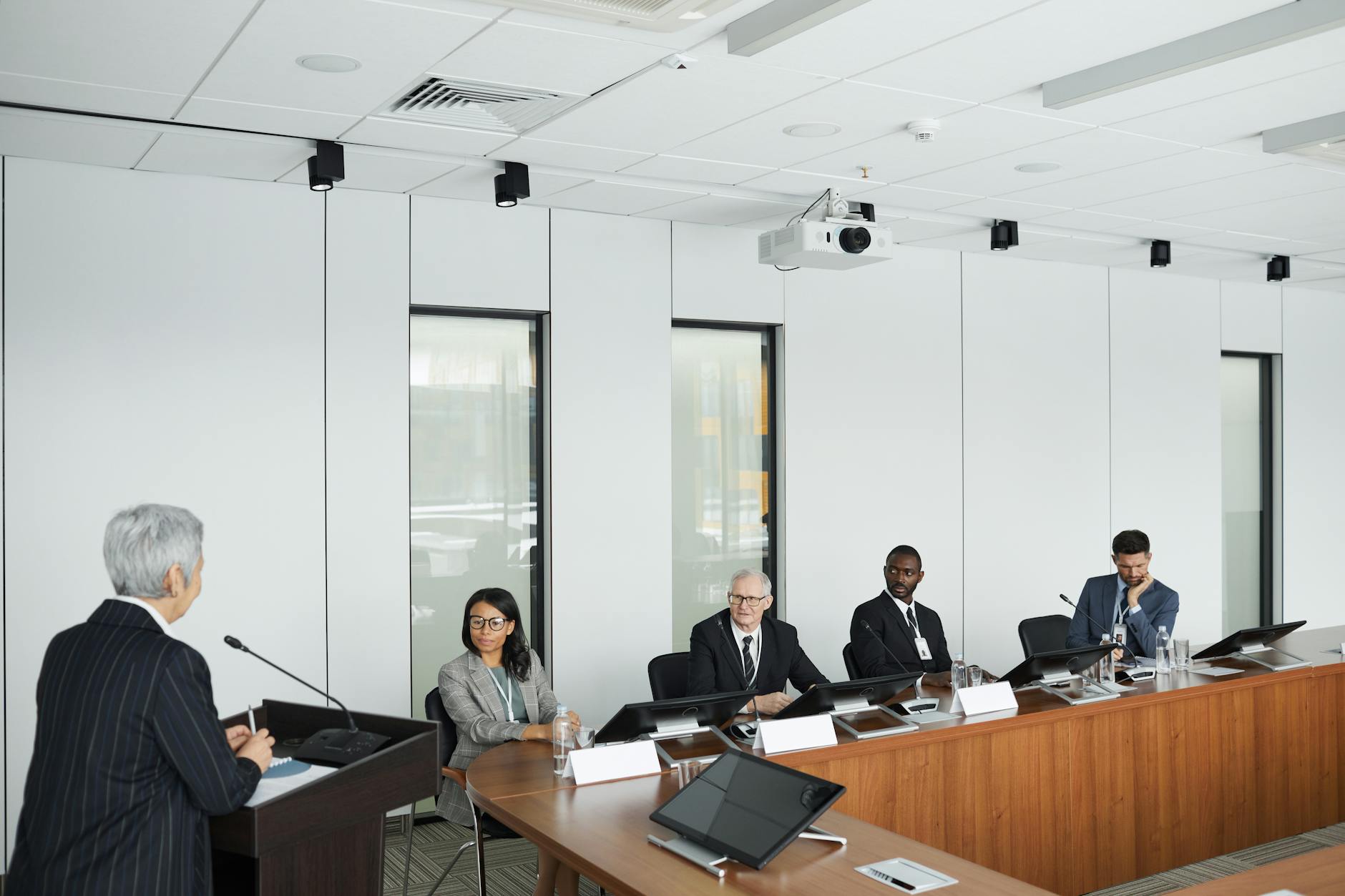 A corporate boardroom in a futuristic setting, with executives interacting with holographic projections of Web 3.0, Metaverse, and DeFi data, emphasizing strategic decision-making.