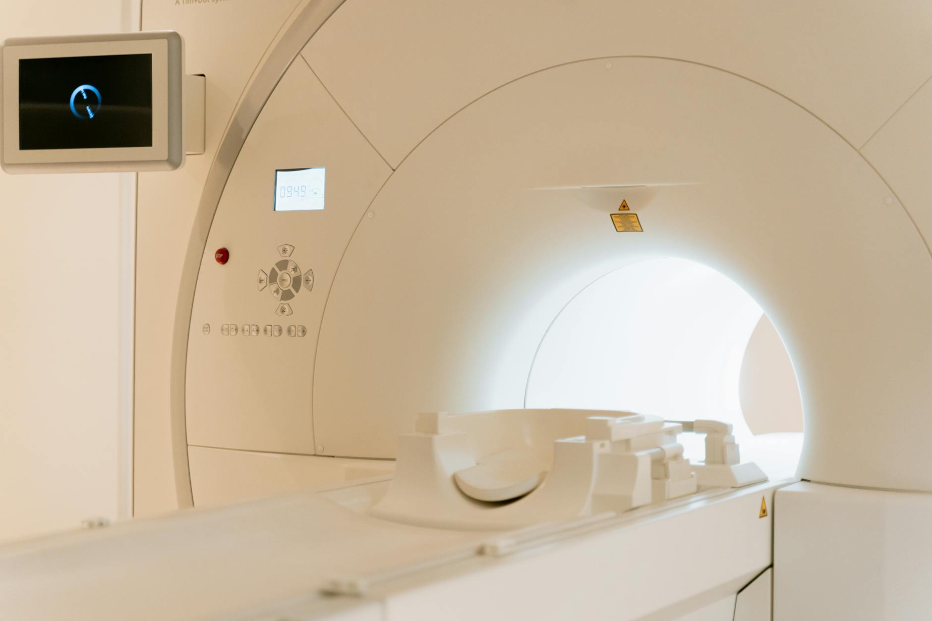 A serene, futuristic medical facility bathed in soft light, with patients interacting with advanced, unobtrusive technology, representing the harmonious integration of AI in healthcare.