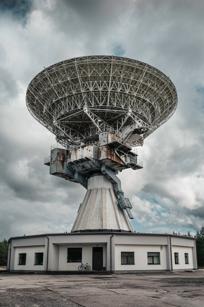 A satellite equipped with advanced quantum sensors observing Earth.