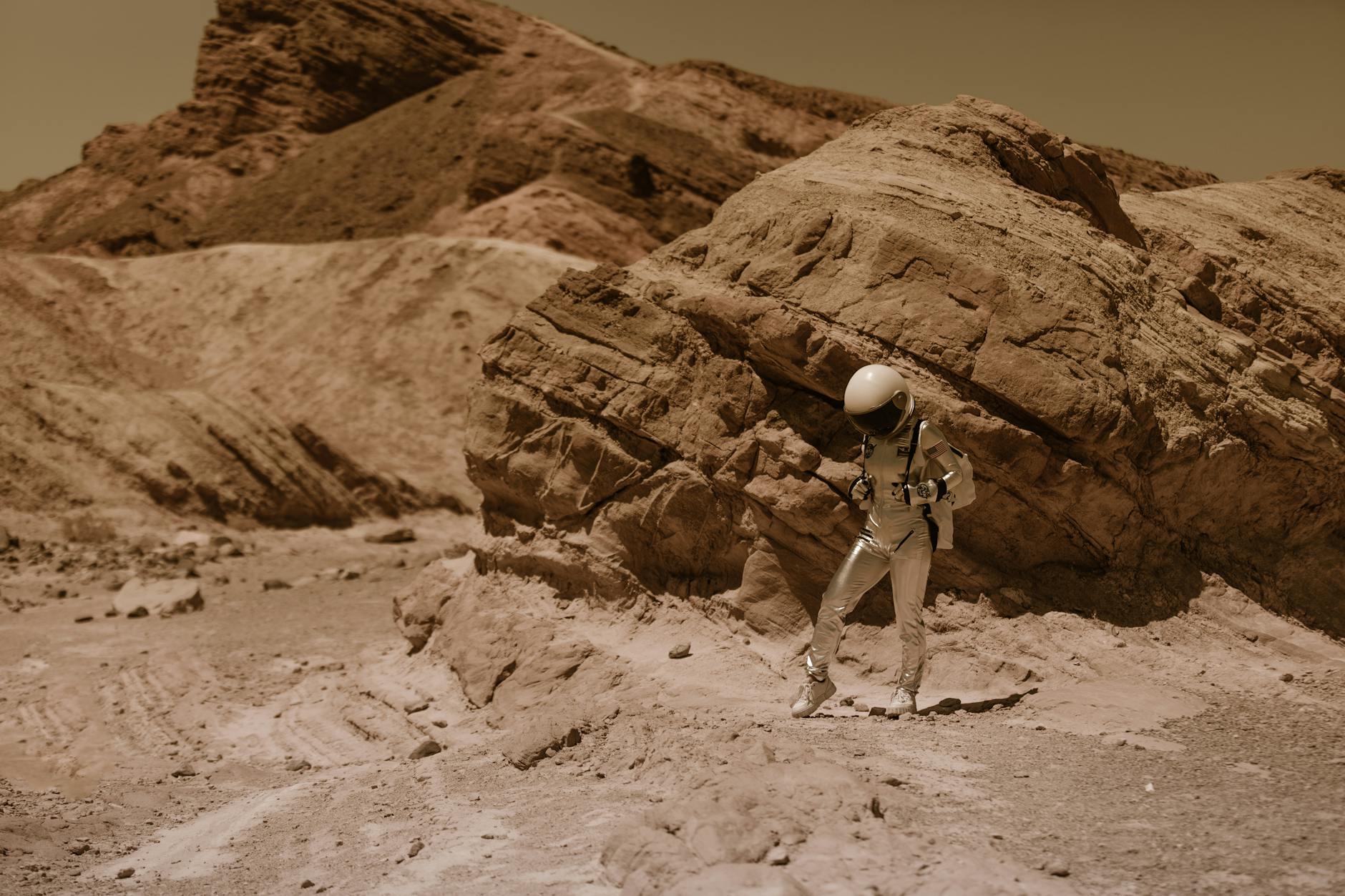A futuristic AI-powered rover on the surface of Mars, analyzing rock samples with advanced sensors.