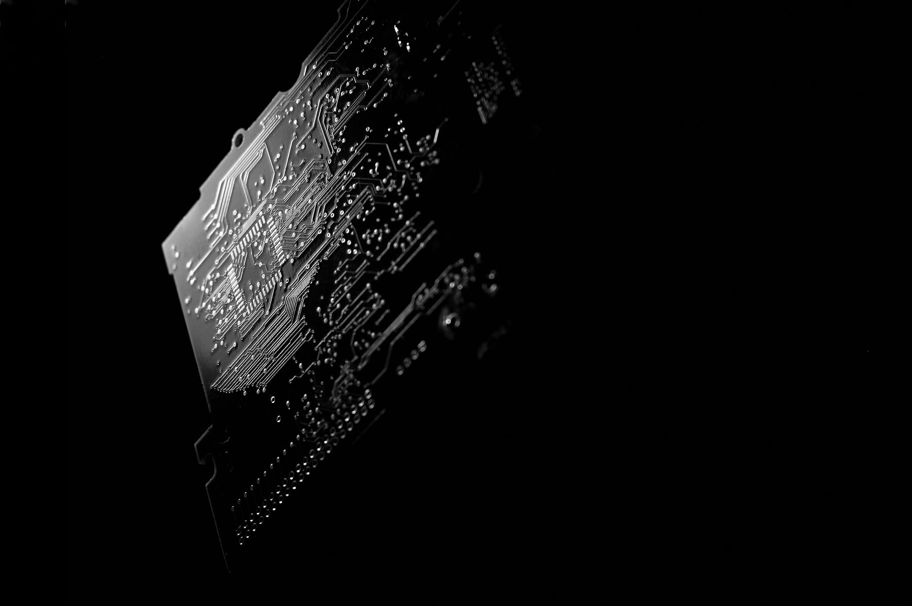 A close-up of a secure data chip with intricate circuitry, symbolizing the high-tech nature of modern industrial security.