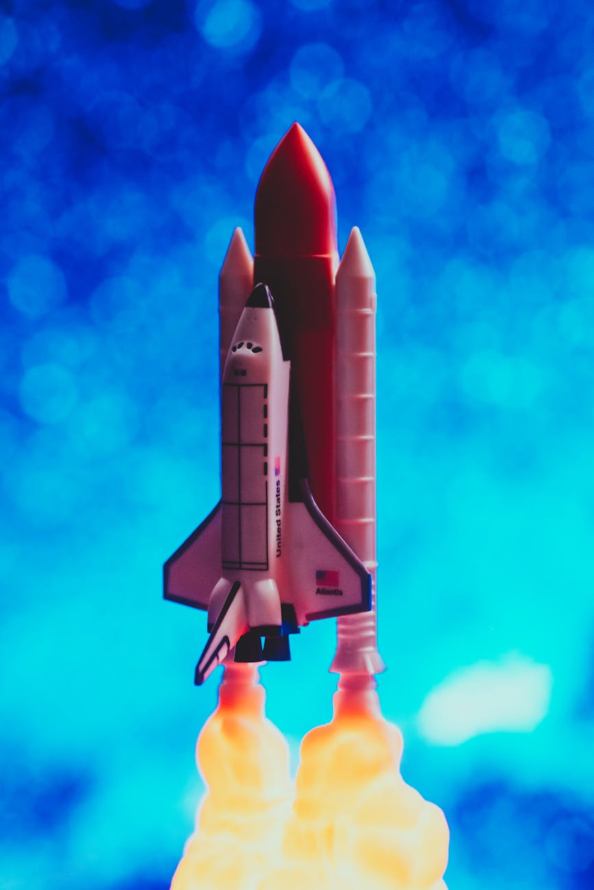 A breathtaking artistic rendering of a fleet of advanced spacecraft venturing into the depths of interstellar space, powered by next-generation propulsion.