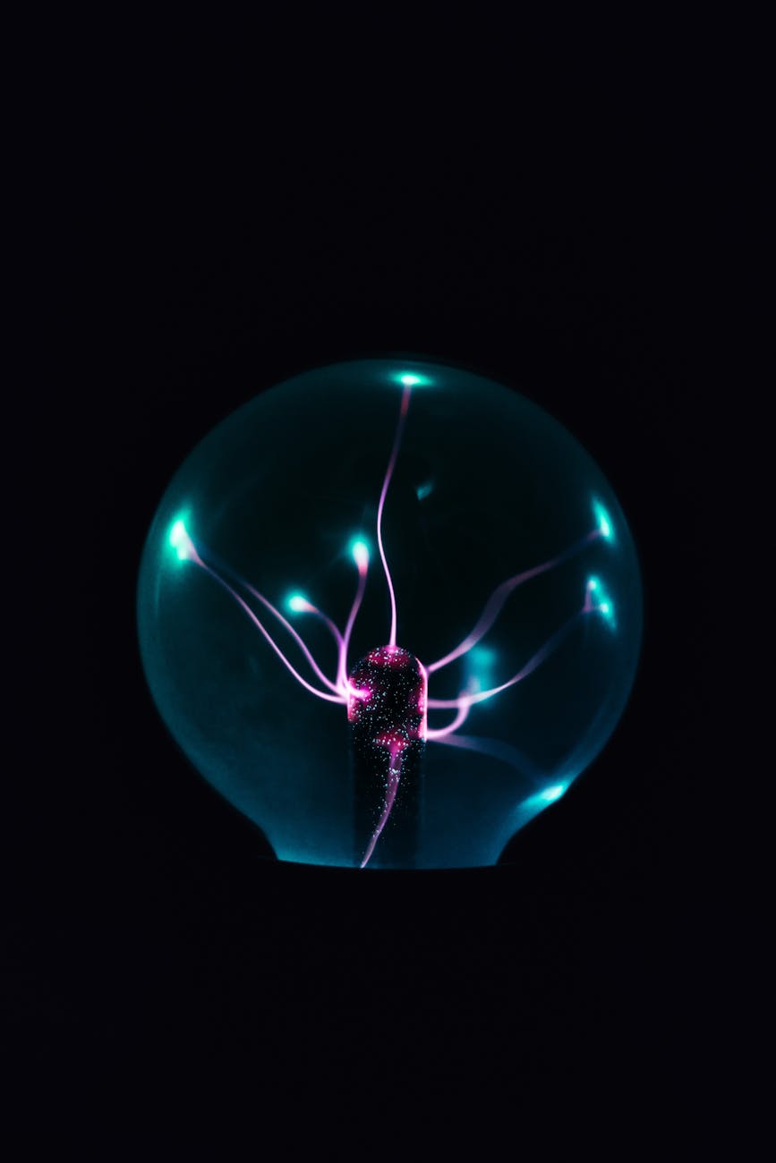 A stylized, futuristic fusion reactor core glowing with intense plasma, surrounded by intricate energy conduits, set against a backdrop of Earth from space.