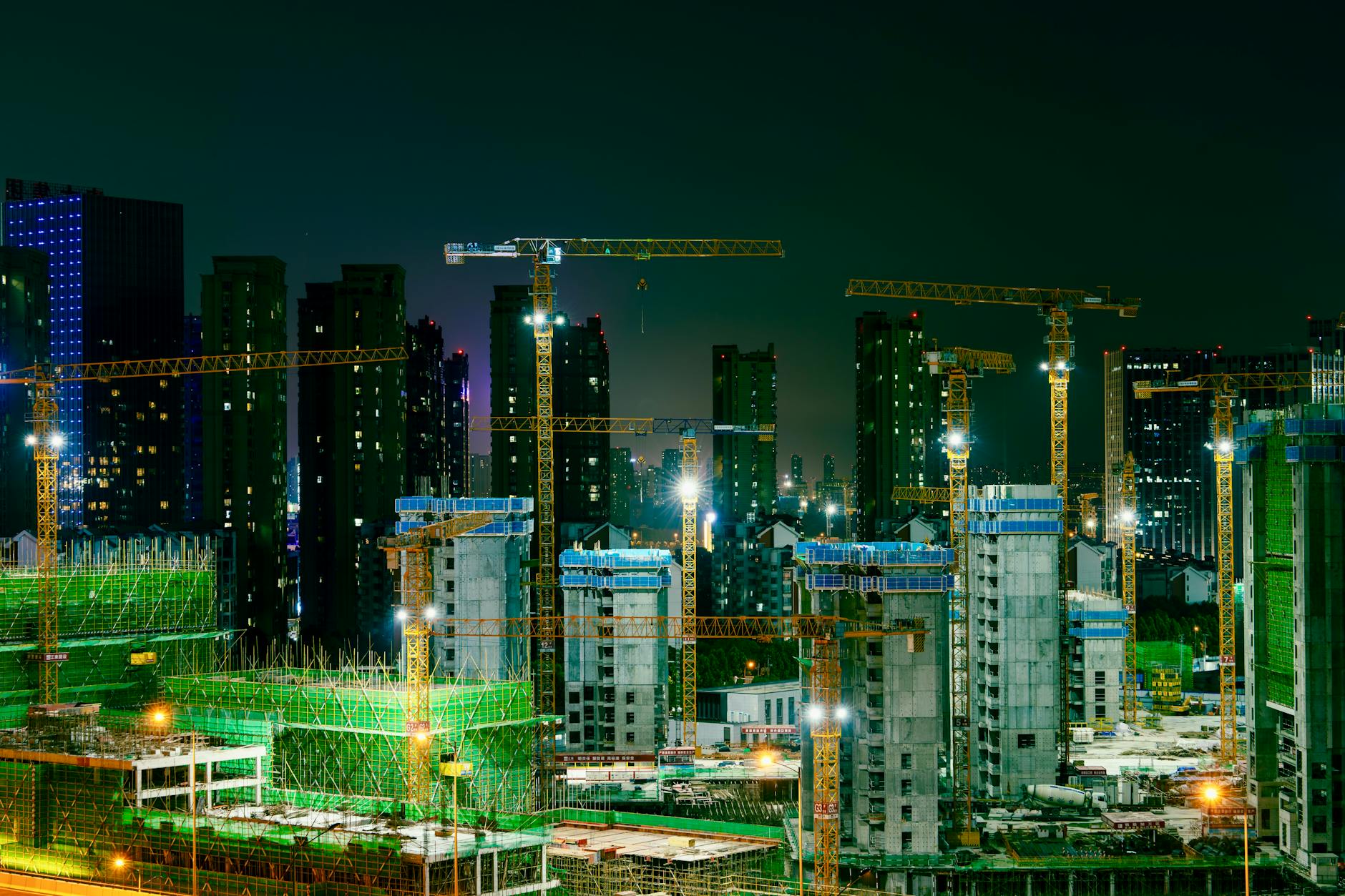 A futuristic cityscape on Mars, with AI-controlled construction robots building habitats and infrastructure.