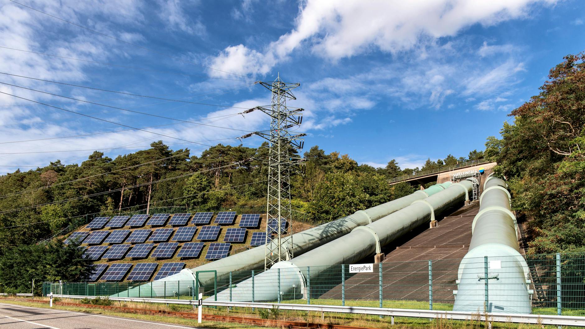 A conceptual illustration of a fully autonomous, AI-controlled EGS power plant seamlessly integrated into a smart city's energy grid.